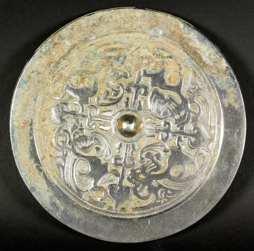 Appraisal: - Bronze Mirror Mirror bronze circular form with designs on