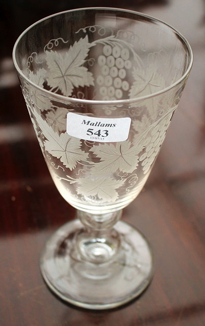 Appraisal: A TH CENTURY ETCHED GLASS WINE GOBLET cm high