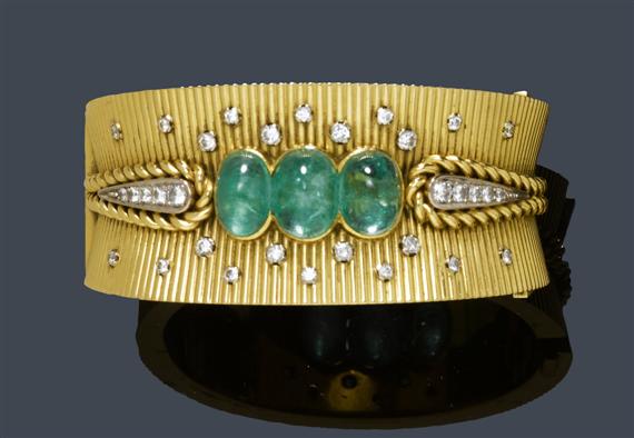 Appraisal: EMERALD DIAMOND AND GOLD BANGLE ca Yellow gold g Decorative