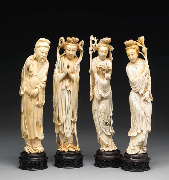 Appraisal: Two tinted ivory figures First half of th Century The