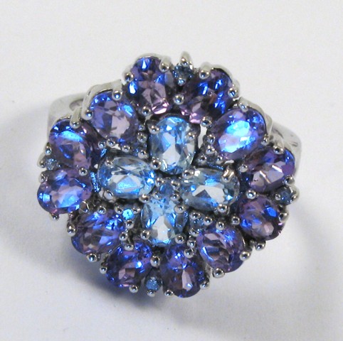 Appraisal: AMETHYST BLUE TOPAZ AND DIAMOND RING k white gold and