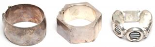 Appraisal: Large Sterling Silver Bracelets Comprising two hinged cuffs and a