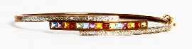 Appraisal: A ct gold multi-gem and diamond bangle inner diameter approximately