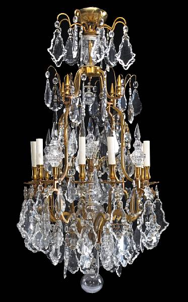 Appraisal: A Rococo style eight light gilt metal and glass chandelier