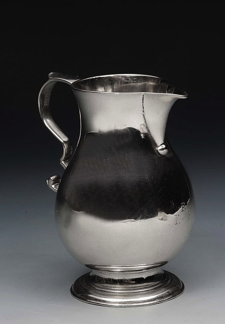 Appraisal: A GEORGE III SILVER BALUSTER SHAPED CREAM JUG with sparrow