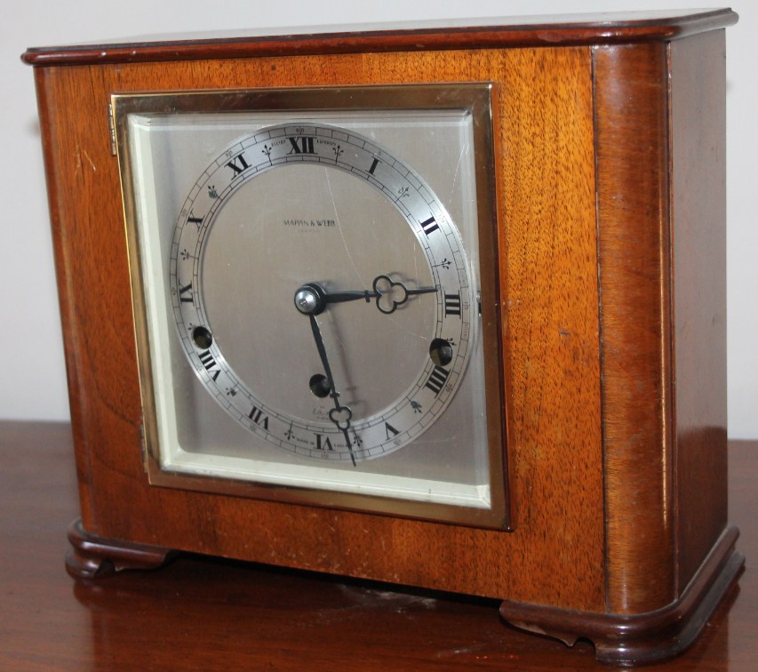 Appraisal: A Mappin Webb walnut mantel clock with eight day Elliot