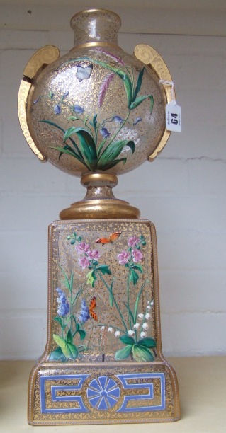 Appraisal: A late Victorian glass two handled vase on stand enamel