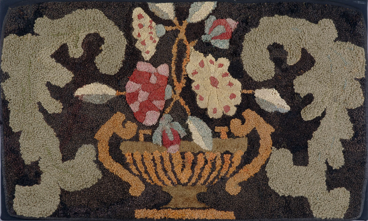 Appraisal: AMERICAN HOOKED RUG WITH BASKET OF FLOWERS On mottled brown-black