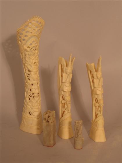 Appraisal: Three bone carvings and two seals H in tallest