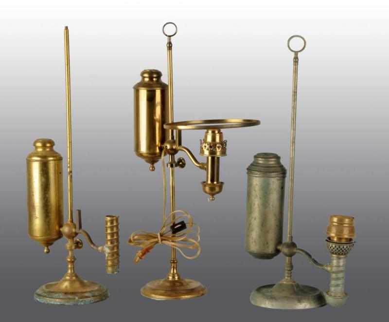 Appraisal: Lot of Brass Student Lamps Description One is electrified Two