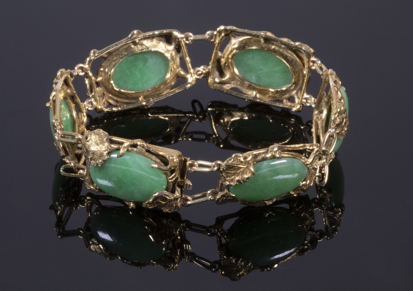 Appraisal: VINTAGE GOLD MOUNTED JADE BRACELET Circa K Yellow Gold Green