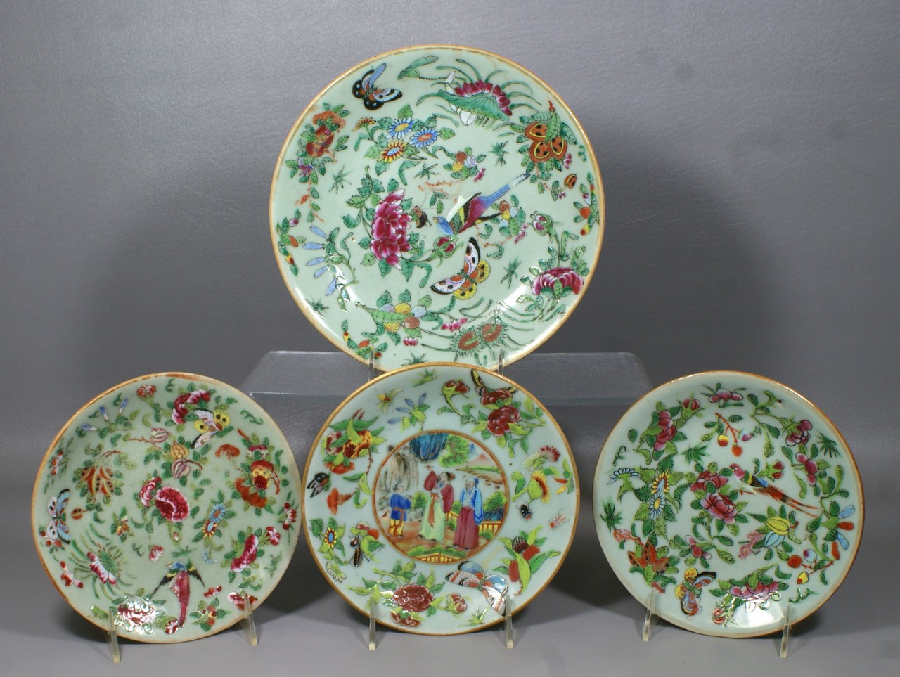 Appraisal: Chinese Celadon plates with enameled Famille rose decoration the other