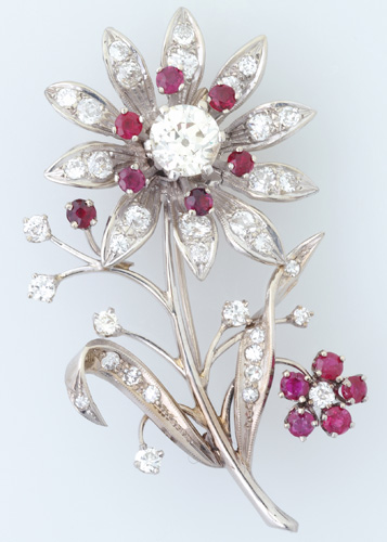 Appraisal: Diamond blossom brooch in k wg with rubies MC diamond