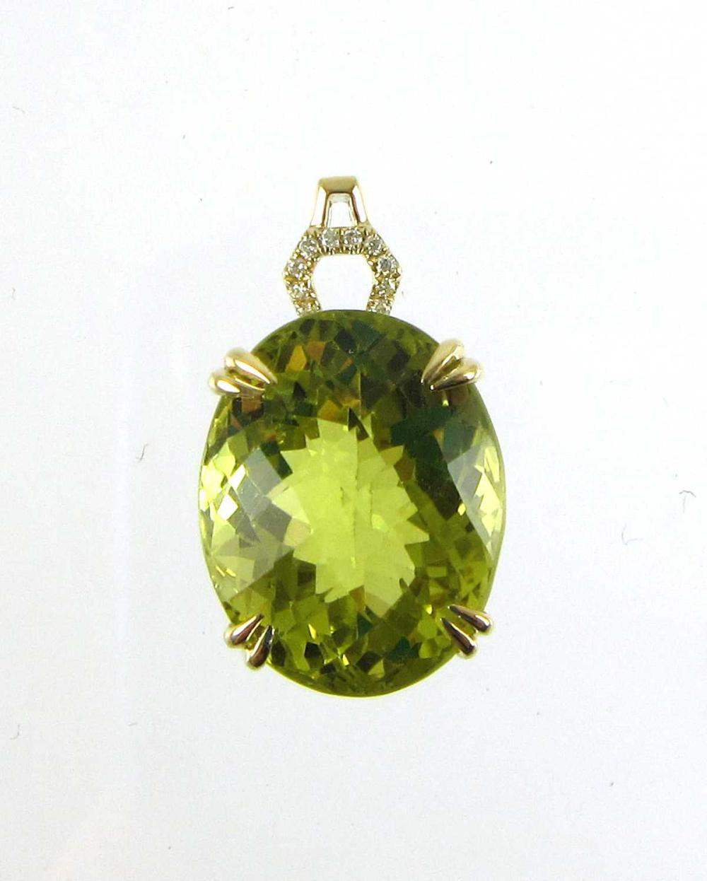 Appraisal: DIAMONDS AND LEMON CITRINE PENDANT Oval checkerboard-cut citrine cts Round-cut