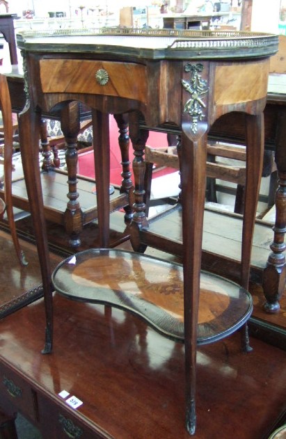 Appraisal: A th century French kidney shaped occasional table the shaped