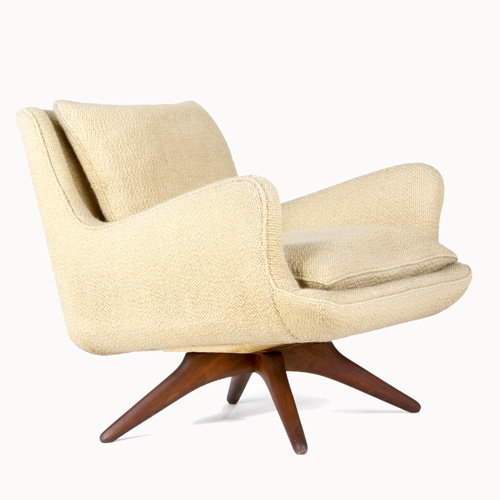 Appraisal: VLADIMIR KAGAN Armchair with original upholstery on walnut base Kagan-Grosfield