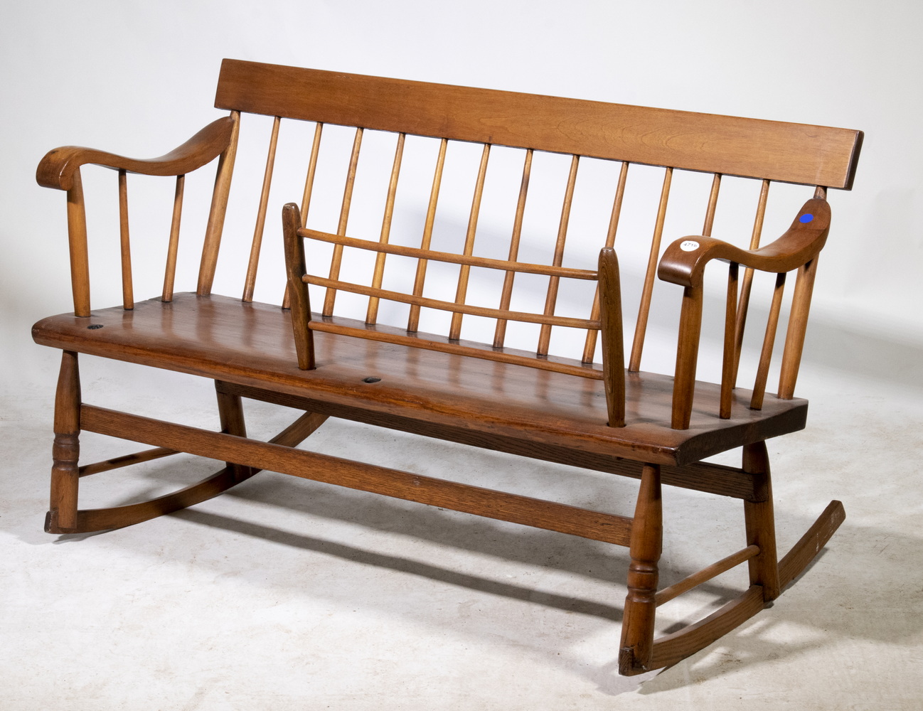 Appraisal: ROCKING MAMMY'S BENCH th c Mahogany Spindle Back Settee with