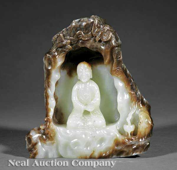 Appraisal: A Chinese Celadon and Russet Jade Scholar's Mountain th c