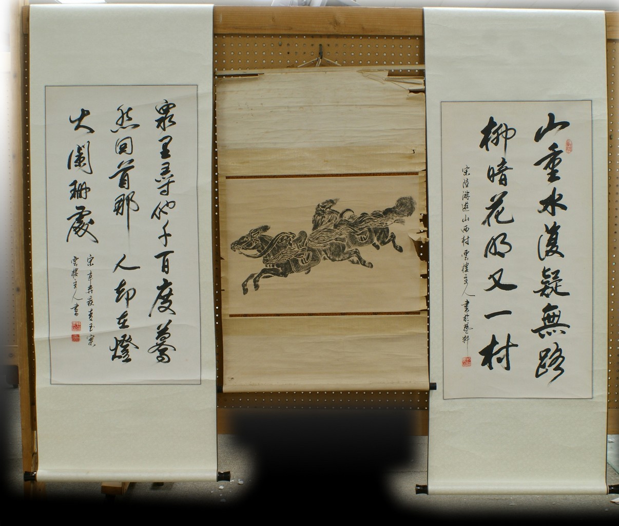 Appraisal: Chinese scrolls a pair with calligraphy images x the other