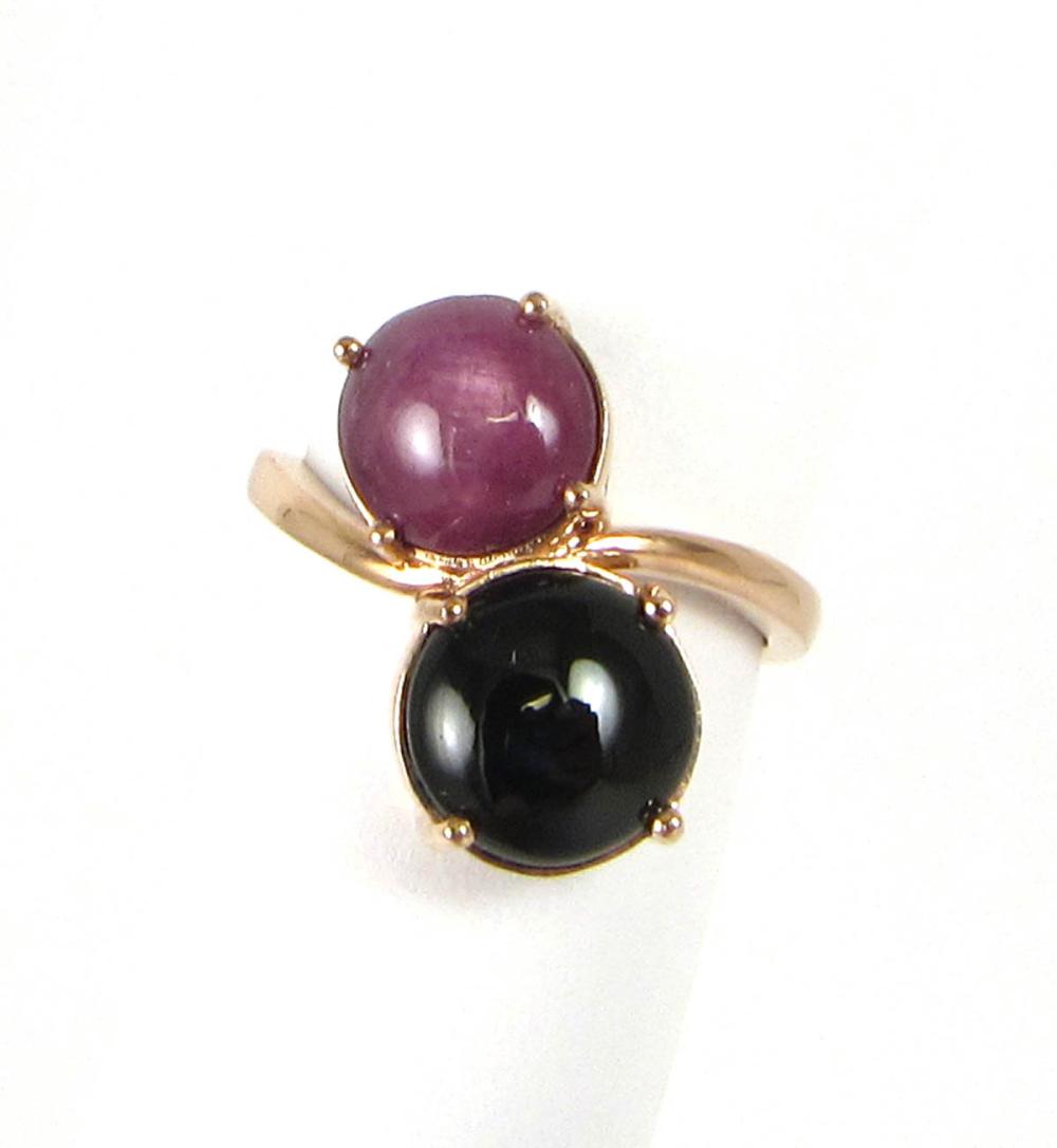 Appraisal: STAR RUBY CAT'S EYE DIOPSIDE AND ROSE GOLD RING The