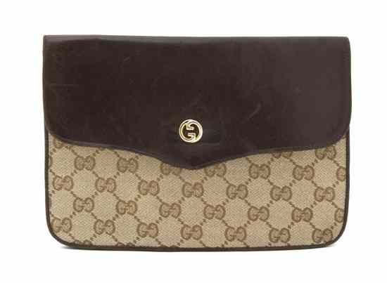 Appraisal: A Gucci Monogram Canvas Envelope Clutch chocolate brown leather back