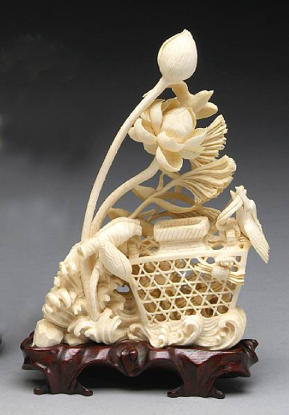 Appraisal: A reticulated ivory carving Depicting a pair of kingfishers perched