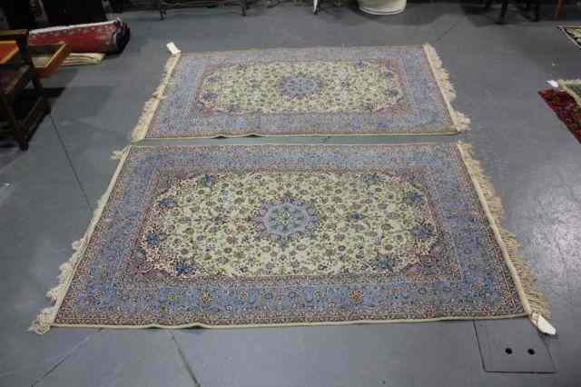 Appraisal: Pair of Silk Wool Persian Handmade Carpets A magnificent and