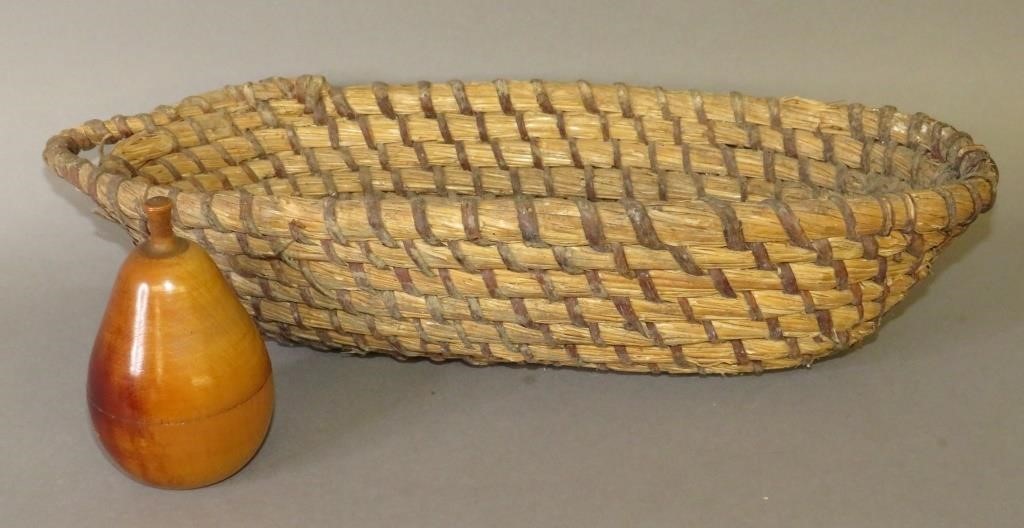 Appraisal: PRIMITIVE ITEMSca th early th century rye straw loaf shaped