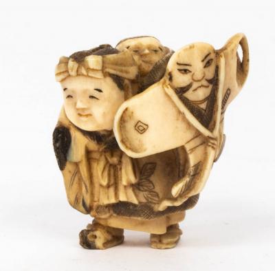 Appraisal: A Japanese ivory netsuke Meiji period depicting a grandmother with