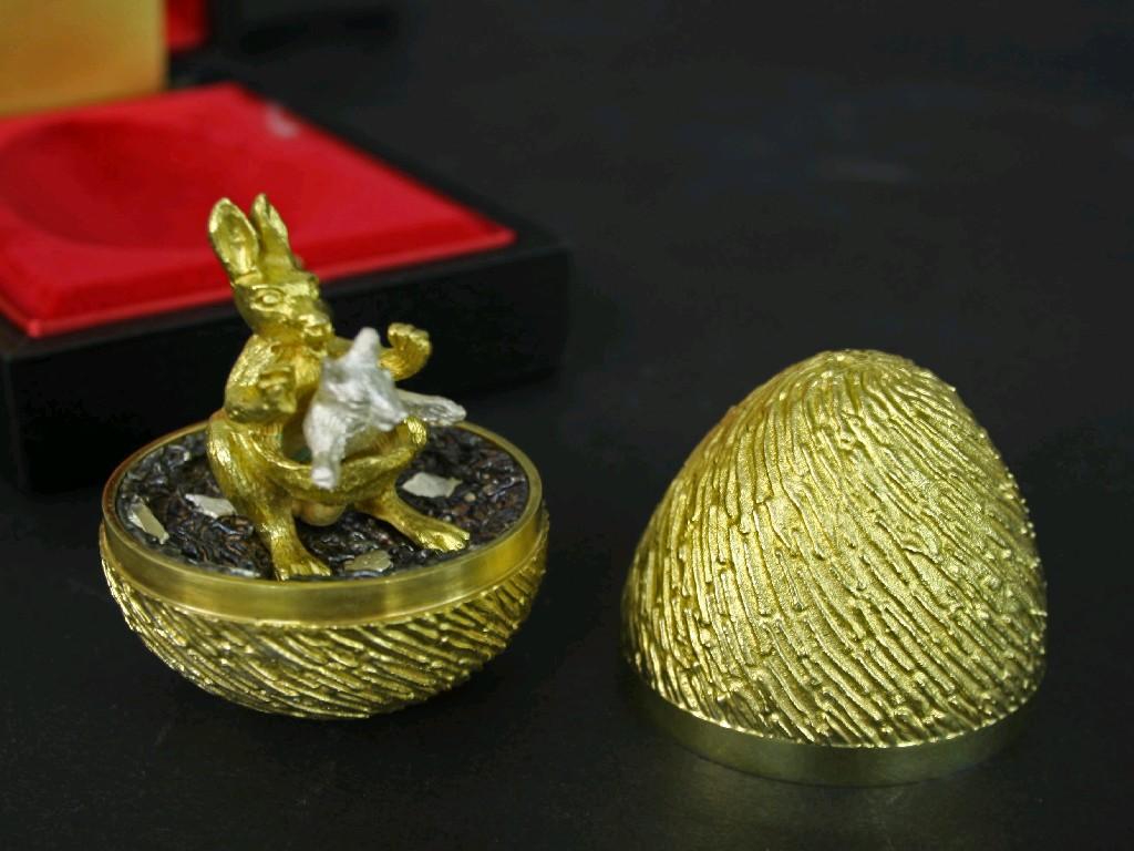 Appraisal: Stuart Devlin silver-gilt Easter egg limited edition the stylised wrythen