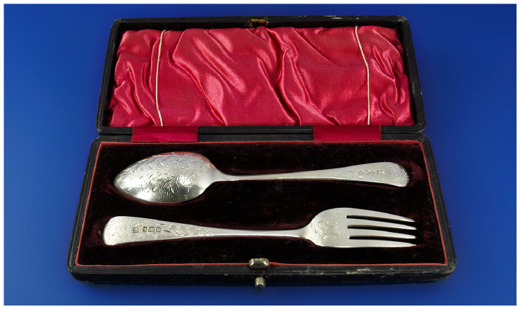 Appraisal: Silver Childrens Spoon and Fork in original velvet interior box