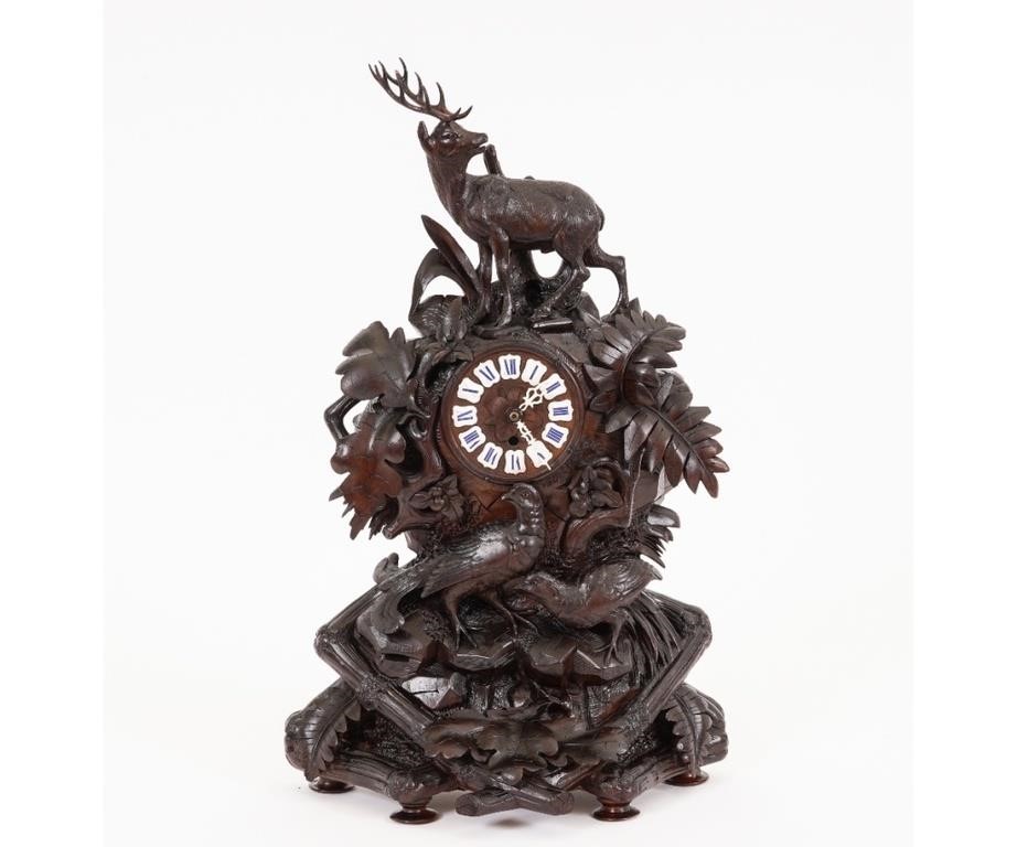 Appraisal: Black Forest carved clock late th c with stag and