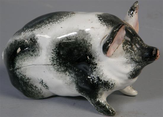 Appraisal: Wemyss pottery black and white pig modelled in a seated