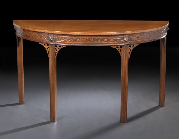 Appraisal: George III-Style Mahogany Console Table the demi-lune top above a