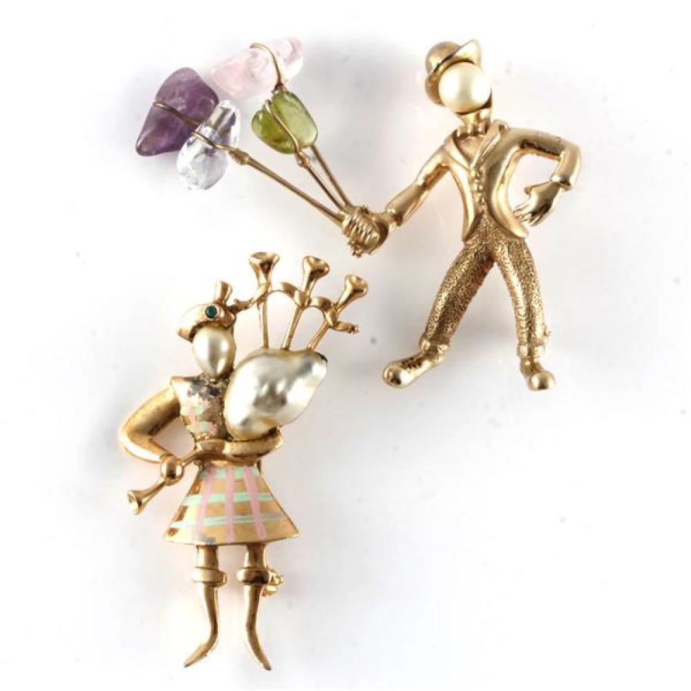 Appraisal: TWO S GOLD TONE PINS DEROSA PEARL FACE GOLD FIGURE