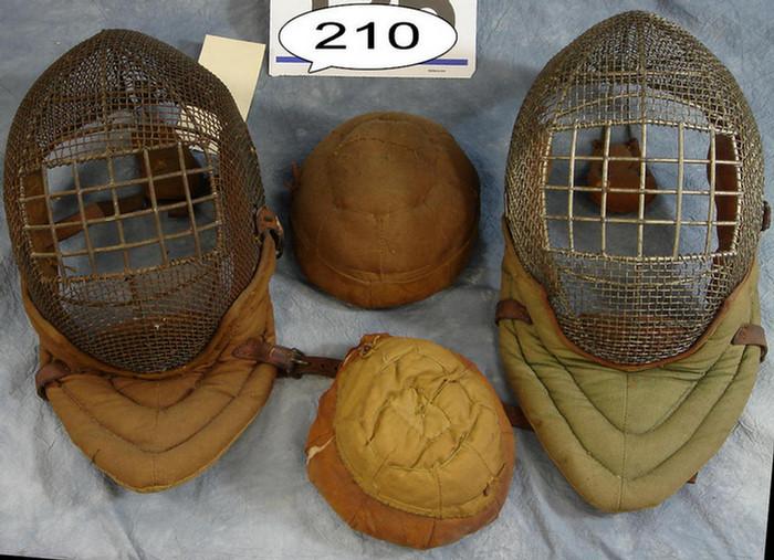 Appraisal: Pair of fencing helmets with pads Estimate -