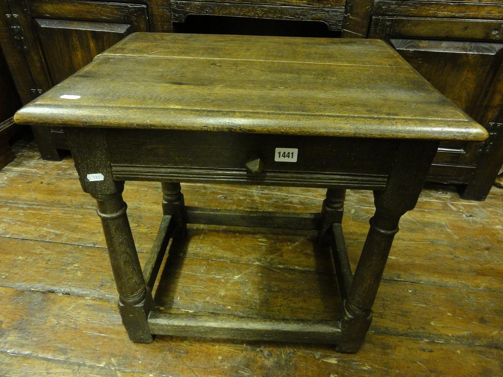 Appraisal: An antique oak side table fitted with a frieze drawer