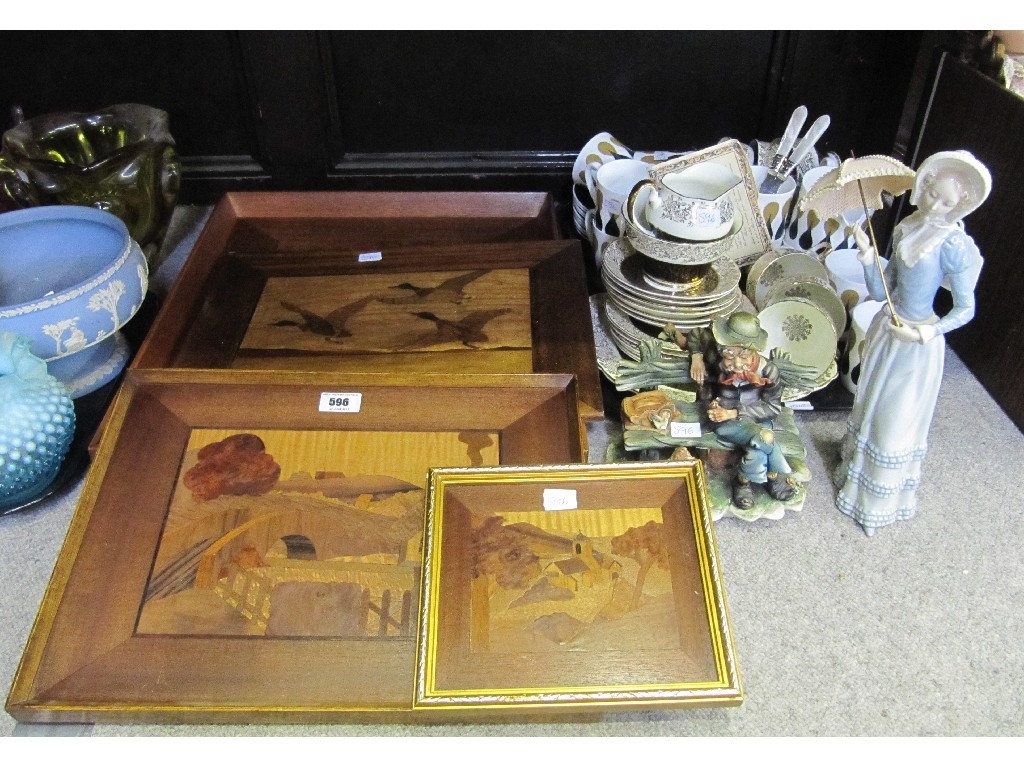 Appraisal: Four wooden decorative picture panels Capodimonte figure Lladro figure and