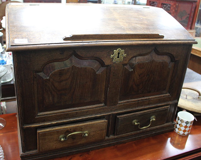 Appraisal: AN OLD OAK TABLE TOP DESK the fall front enclosing