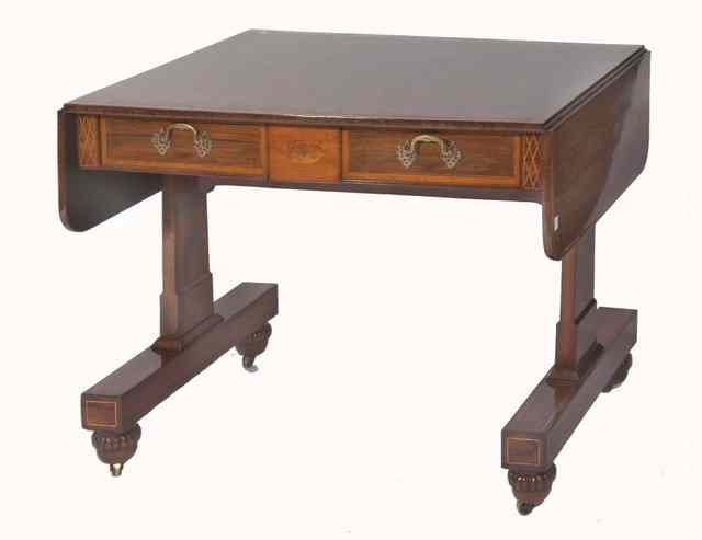 Appraisal: A TH CENTURY ROSEWOOD SOFA TABLE fitted with two drop