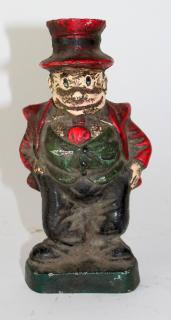 Appraisal: Painted cast iron business man bank Painted cast iron business