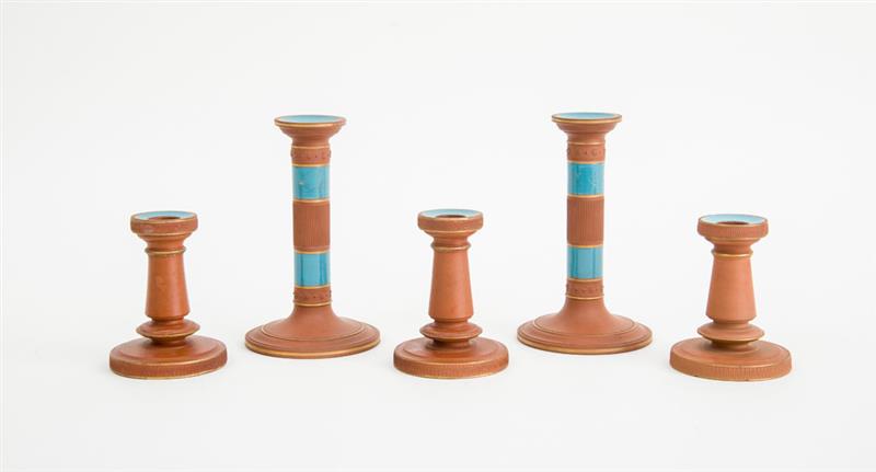 Appraisal: CHRISTOPHER DRESSER ATTRIBUTION Two pairs of Watcombe Terracotta Co Torquay