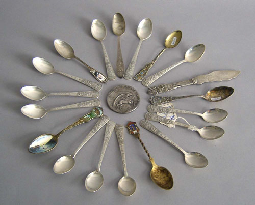 Appraisal: Eighteen American silver souvenir spoons together with a butter knife