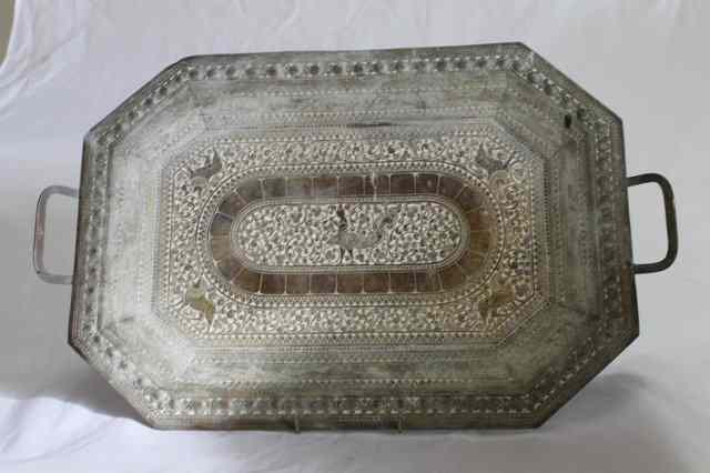 Appraisal: AN INDIAN BENARES HEXAGONAL TRAY with allover foliate scroll lion