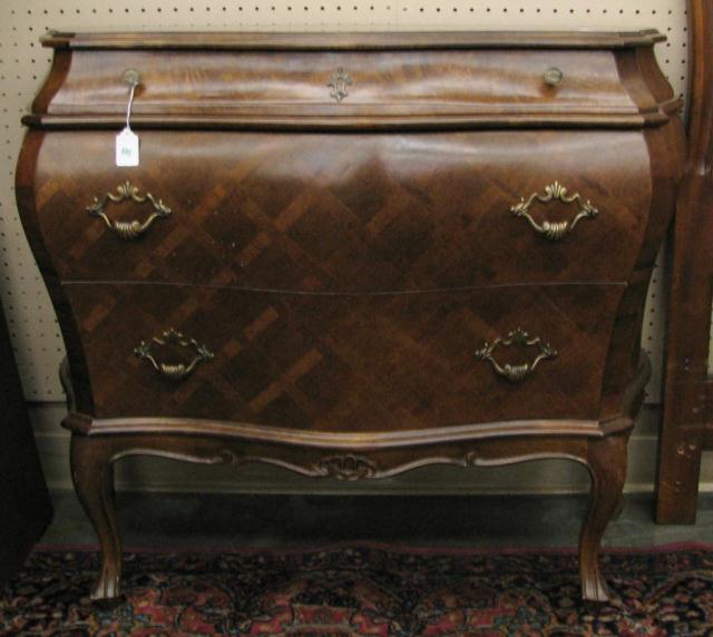 Appraisal: Decorator Three-Drawer Bombe Chest French style with burl and parquetry