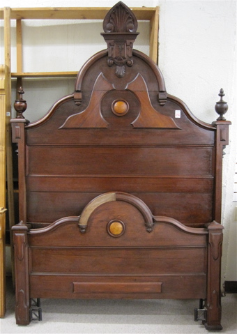 Appraisal: VICTORIAN WALNUT BED WITH RAILS Rococo Revival style American last