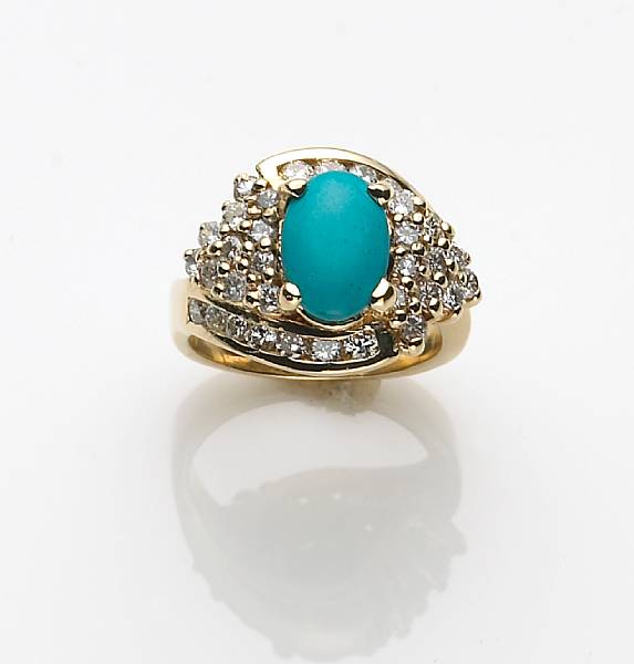 Appraisal: A blue stone diamond and k gold ring