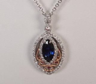 Appraisal: K WHITE GOLD DIAMOND AND BLUE SAPPHIRE PENDANT NECKLACE WITH