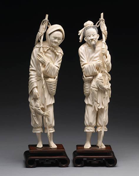 Appraisal: Two large ivory figures of a fisherman and woman th