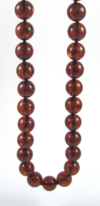 Appraisal: BALTIC PRESSED AMBER BEAD NECKLACE measuring - inches in length